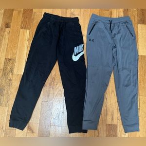 Set of 2 boys sweatpants. Nike youth XL. Under Armour XL.